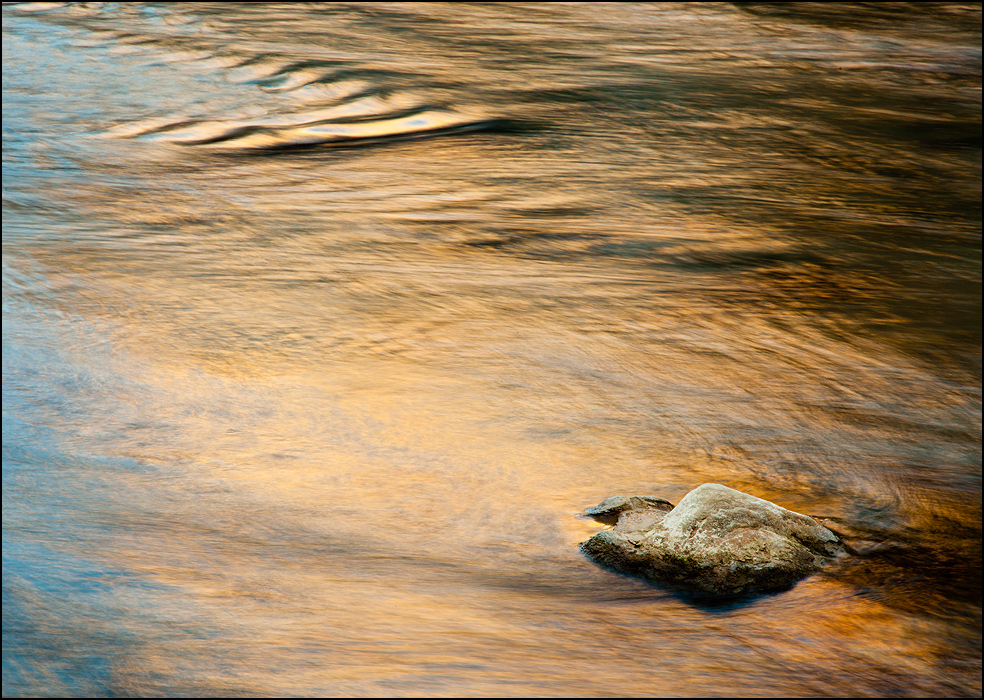 Gold and blure reflections in the Virgin River, Zion National Park, Utah